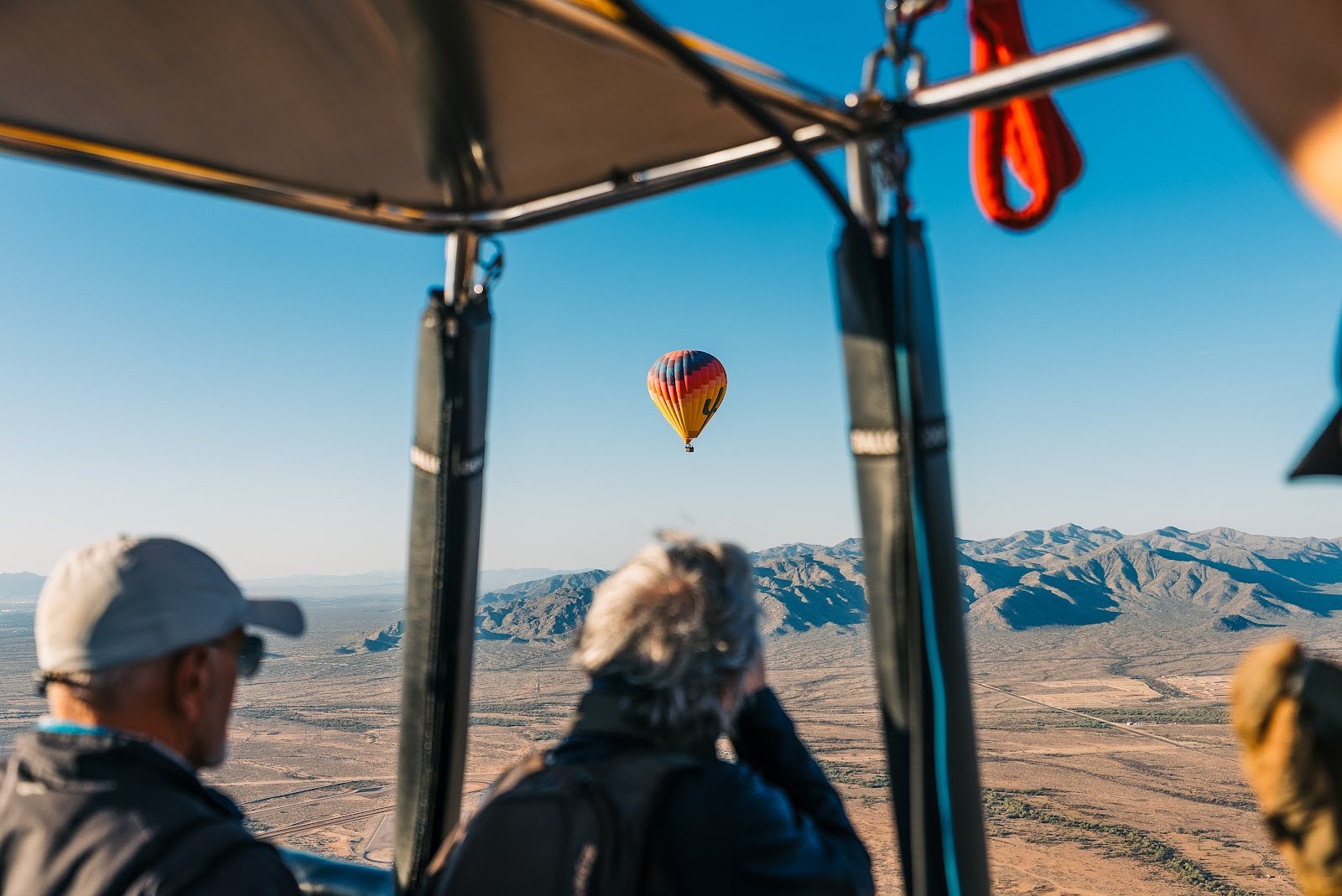 A couple in a hot air balloon